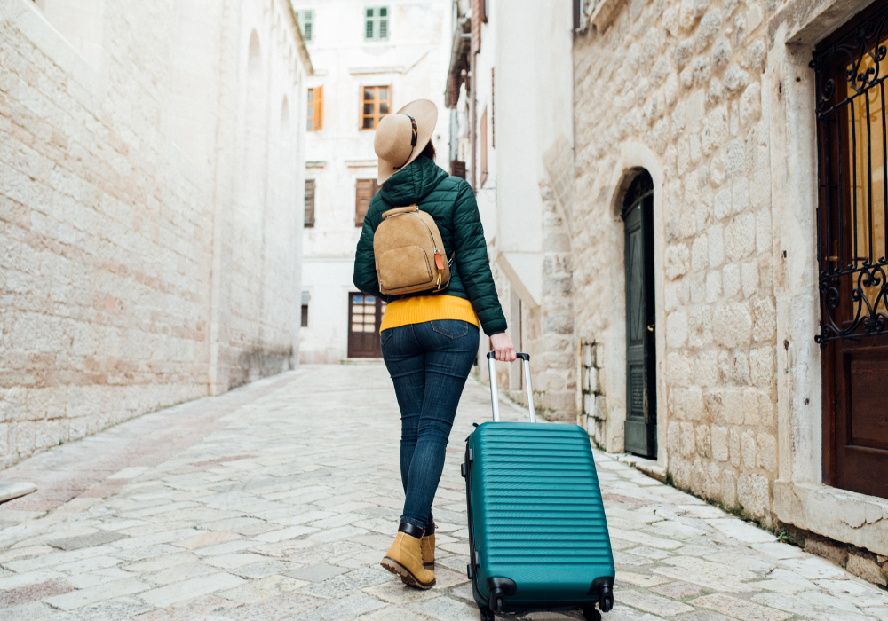 student-walking-with-luggage-gallery